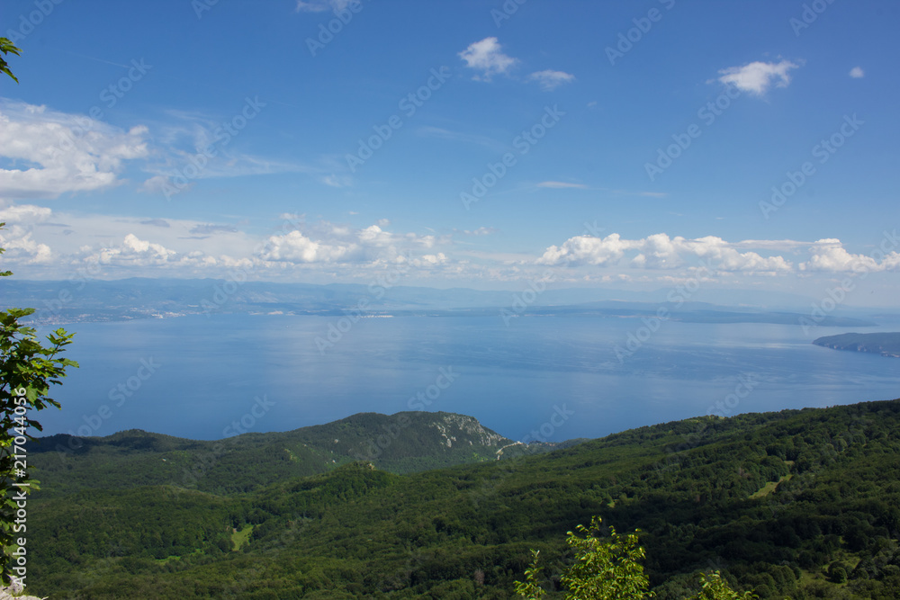 Resort nature scenery landscape mountain ridge and sea from above in bright summer hot day time