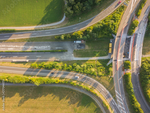 Aerial view of highway interchange on green meadow in Switzerland, Europe
