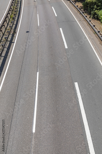 aerial of empty highway with road markings