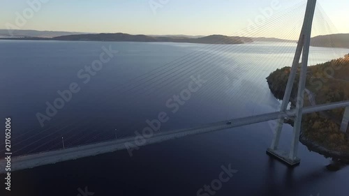 Aerial of large cable bridge in beautiful Norwegian landscape photo