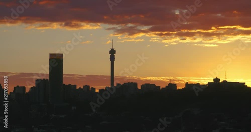 Magnificent Johannesburg / Joburg sunset with golden clouds and vista of the city. photo
