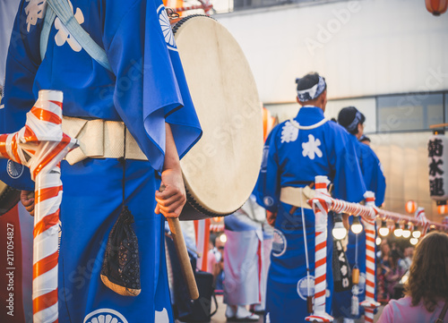Drummer performance, Taiko Drums Japanese folklore. Japanese artists perform at Bon Festival in blue kimonos with big drums
