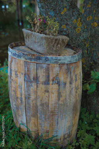 wooden old gray barrel on the nature