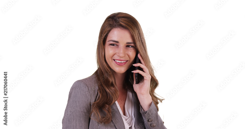 Pretty Caucasian female having conversation on smartphone for copy space Pretty Caucasian female having conversation on smartphone for copy space