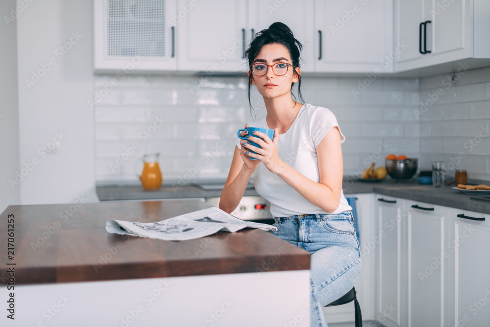 Beautiful young woman drinking coffee Beautiful young woman drinking coffee