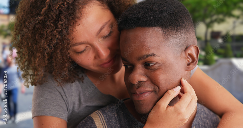 Happy black millennial couple smiling and being affectionate near Spanish steps Happy black millennial couple smiling and being affectionate near Spanish steps