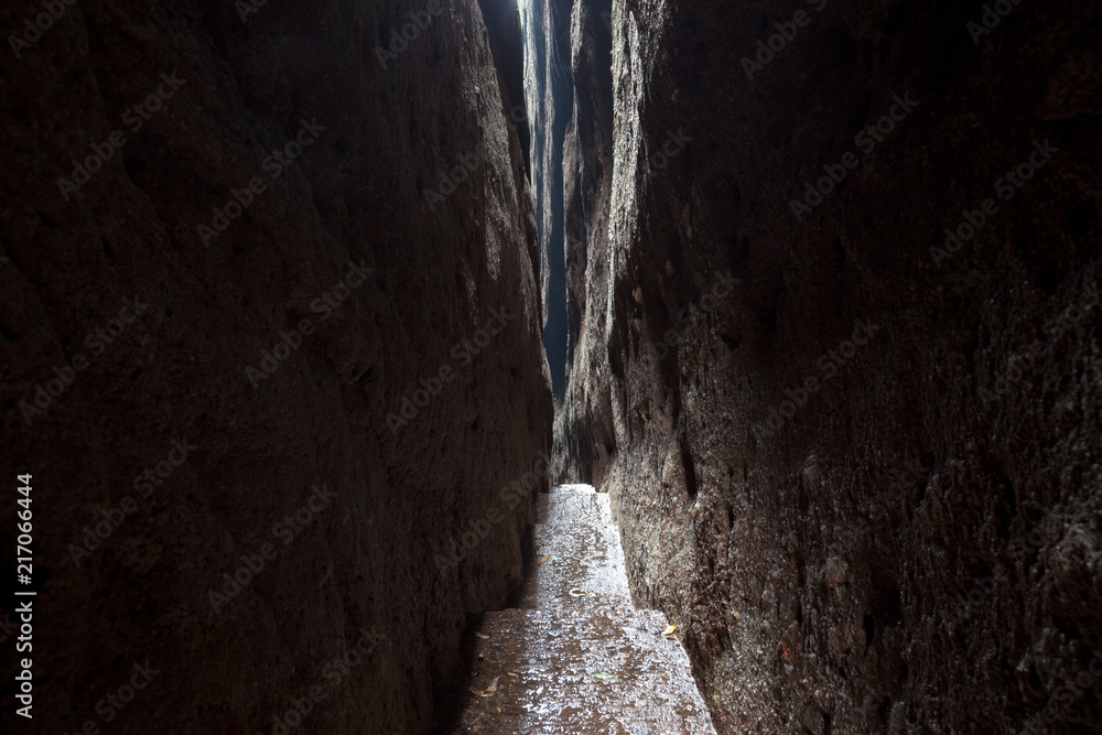 Sky Lane Cave scenery in Lang Mountain, Langshan - China National Geopark, Xinning County Hunan province. Unique Danxia Landform, UNESCO Natural World Heritage site. Narrow walkway, claustrophobic Sky Lane Cave scenery in Lang Mountain, Langshan - China National Geopark, Xinning County Hunan province. Unique Danxia Landform, UNESCO Natural World Heritage site. Narrow walkway, claustrophobic