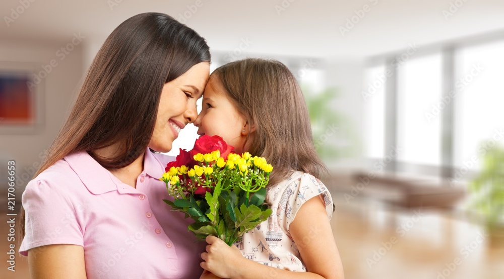 Happy Mother and daughter hugging Happy Mother and daughter hugging