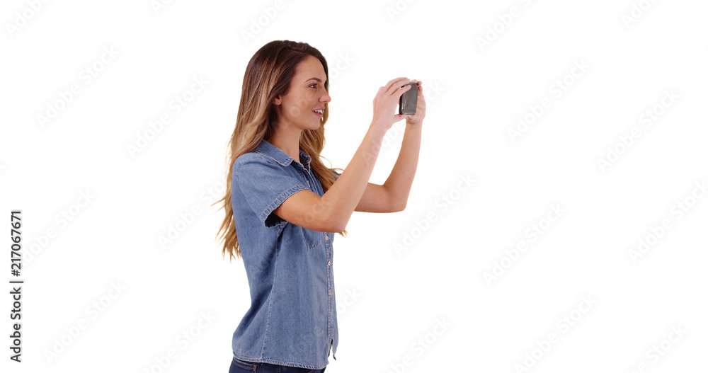 Woman tourist taking pictures of summer vacation on white background Woman tourist taking pictures of summer vacation on white background