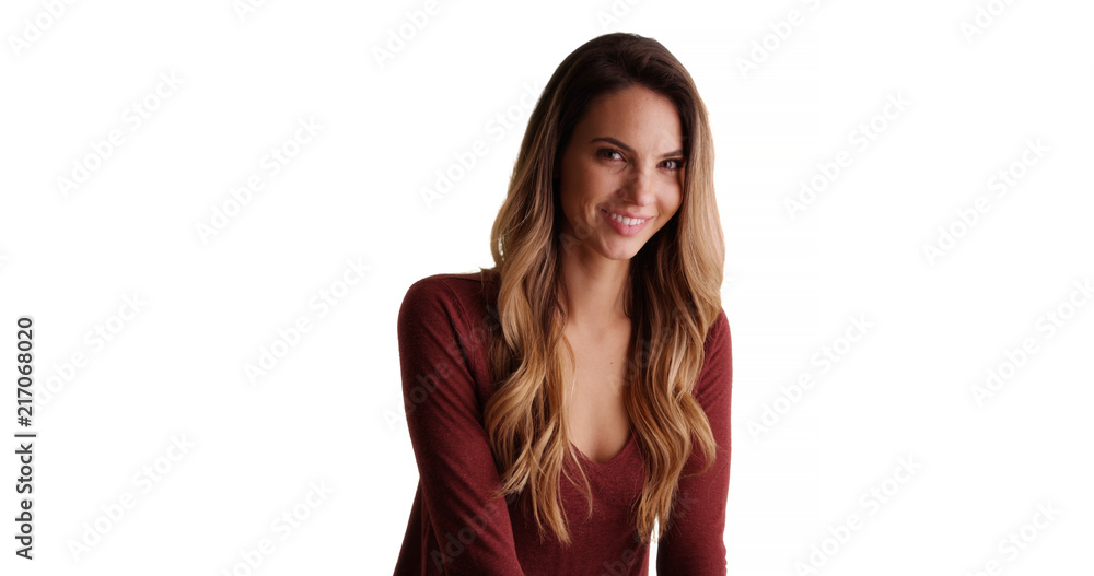Portrait of Caucasian woman with beautiful smile in studio with copyspace Portrait of Caucasian woman with beautiful smile in studio with copyspace