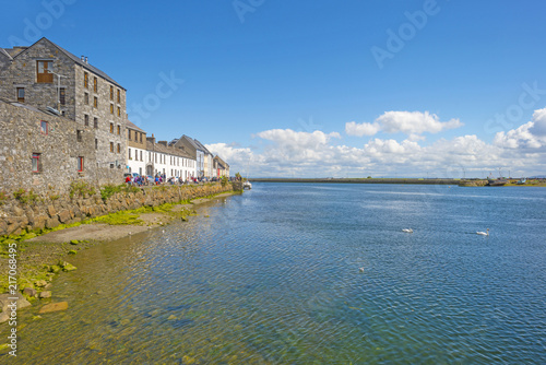 River through the city of Galway in Ireland in summer