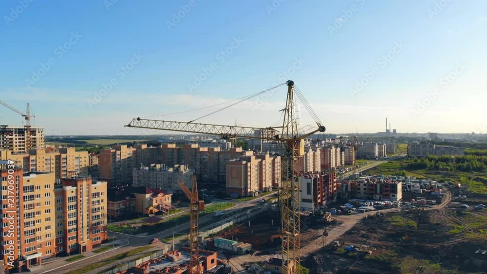 Real estate concept. Construction site from above. Urban landscape in daylight with a building area Real estate concept. Construction site from above. Urban landscape in daylight with a building area