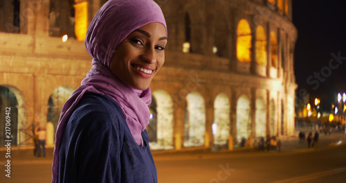 Photography Portrait of beautiful young Muslim woman in Rome Italy happy and excited