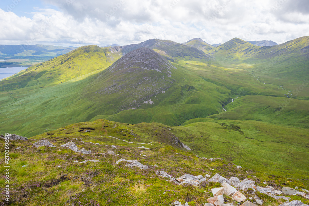 Panorama of mountains, marshy land and heathland of Connemara National Park in summer Panorama of mountains, marshy land and heathland of Connemara National Park in summer