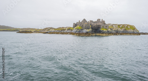 View of an irish island from the atlantic ocean in summer photo
