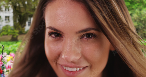 Close up portrait of beautiful young woman smiling