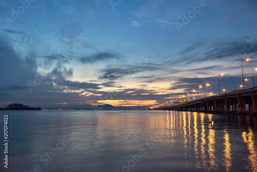 The Penang bridge against the background of colourful dawn