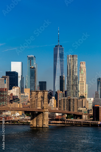 Brooklyn, NY / USA - JUL 31 2018: Lower Manhattan Skyline in clear daylight in the early morning © Edi Chen