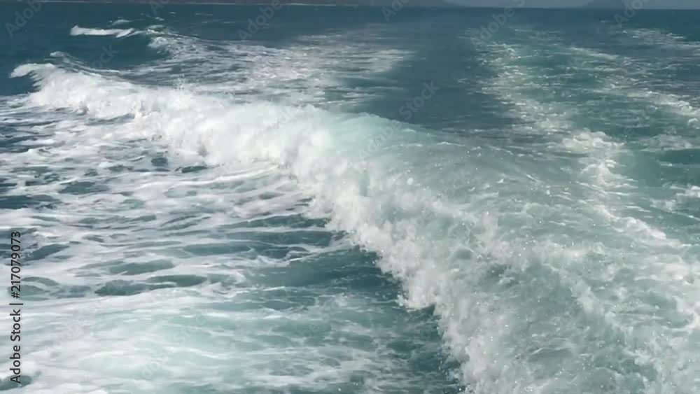 Water behind a boat as a ship is moving