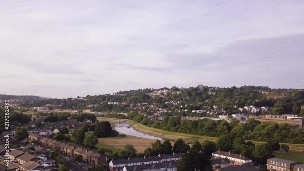 Beautiful aerial view of a local residential area in Exeter with a river flowing through. Beautiful aerial view of a local residential area in Exeter with a river flowing through.