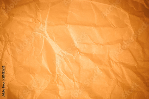 Brown crumpled paper background.