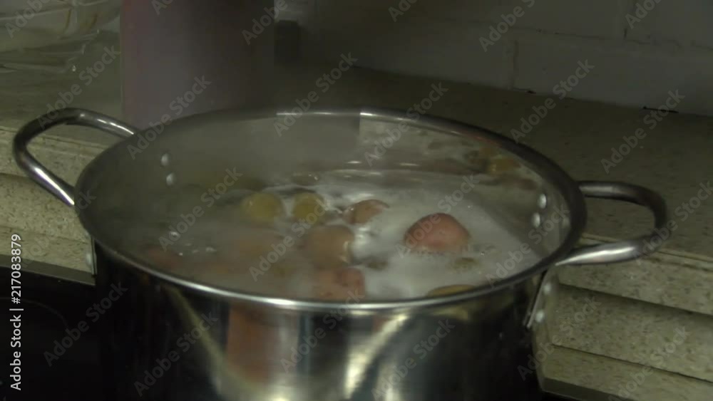 Pot of Potatoes Boiling on stove Pot of Potatoes Boiling on stove