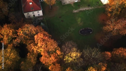 Beautiful view of castle in autumn. Palace in Europe. Aerial view 4k drone