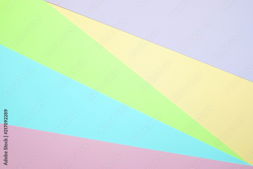 Fashionable pastel colored paper flat lay top view, geometric background texture, pink, purple, yellow, beige, green and blue. Fashionable pastel colored paper flat lay top view, geometric background texture, pink, purple, yellow, beige, green and blue.