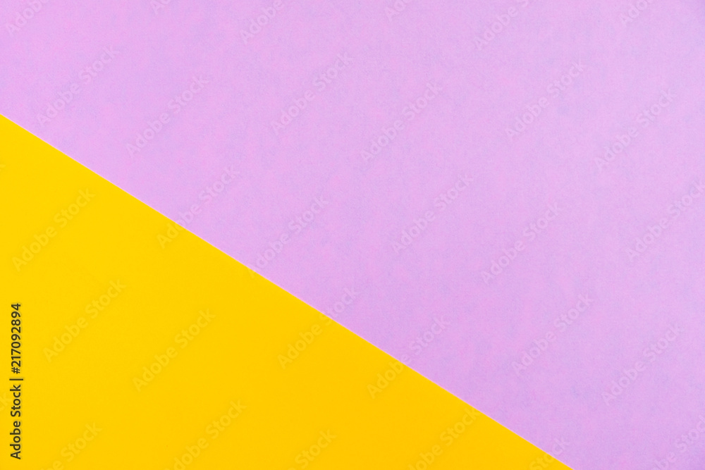 Pastel colored paper flat lay top view, background texture, pink, purple, yellow, orange