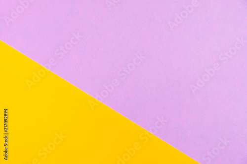 Pastel colored paper flat lay top view  background texture  pink  purple  yellow  orange