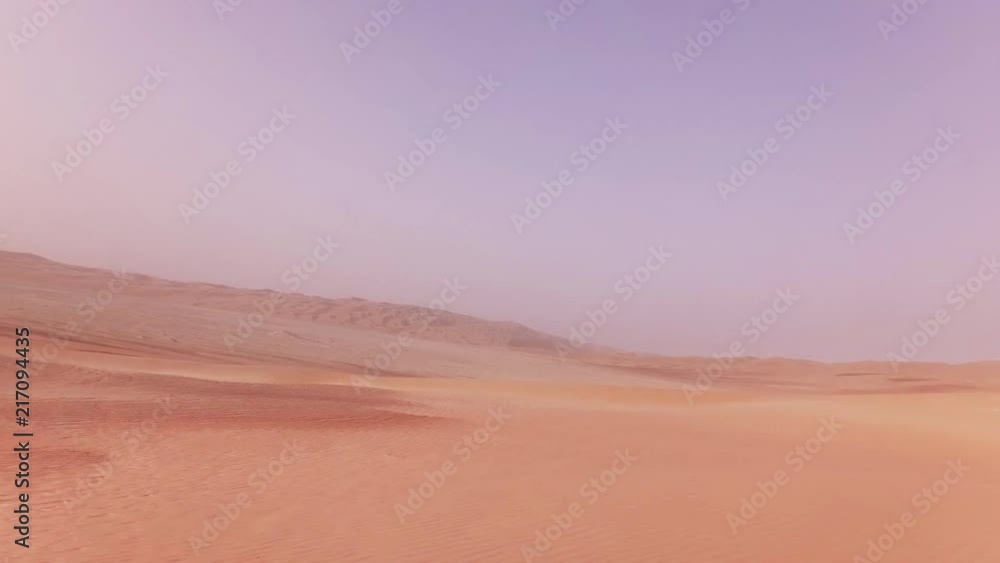 Traveling on an off-road car on the sand of Rub al Khali desert stock footage video