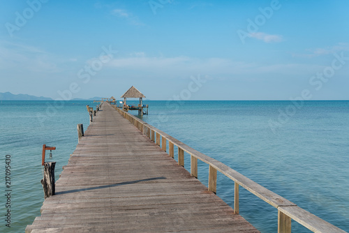 Wooden pier with boat in Phuket  Thailand. Summer  Travel  Vacation and Holiday concept.