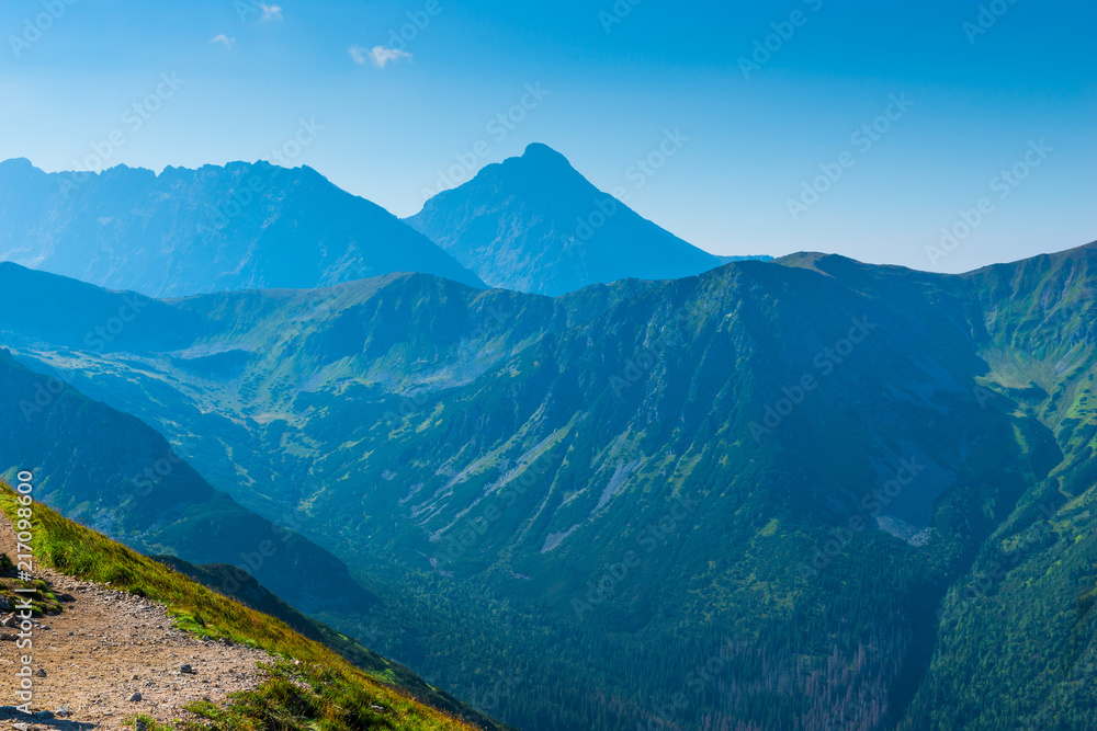 High beautiful mountains of the Tatra in the haze, picture on a sunny day
