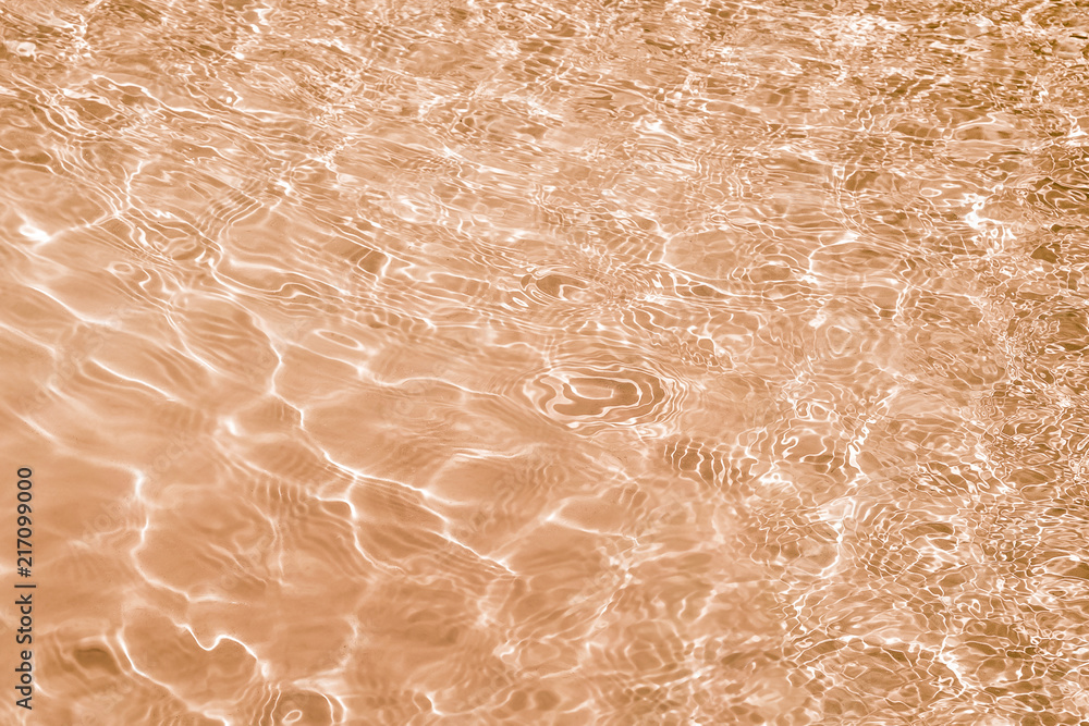 Fototapeta premium Abstract texture of water, tinted in light brown color_
