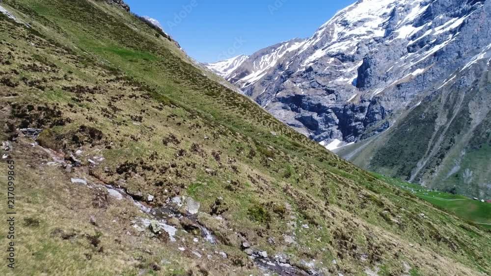 aerial flight over amazing mountain scenery during spring, melting snow in engelberg switzerland aerial flight over amazing mountain scenery during spring, melting snow in engelberg switzerland