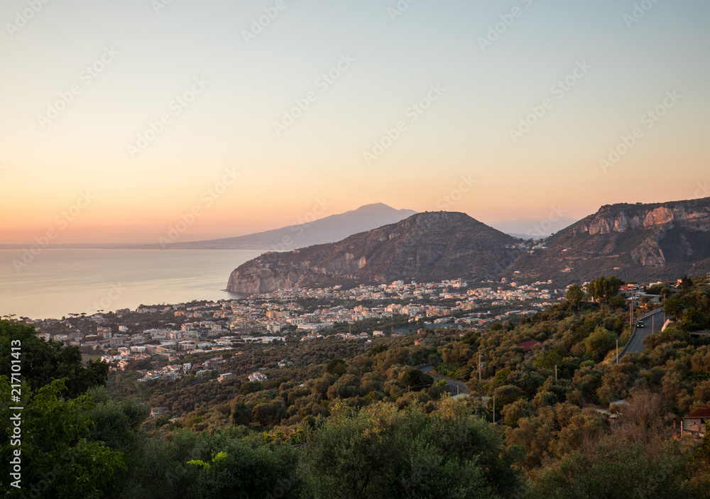 Romantic sunset in the Gulf of Naples and Vesuvius. Sorrento. Italy