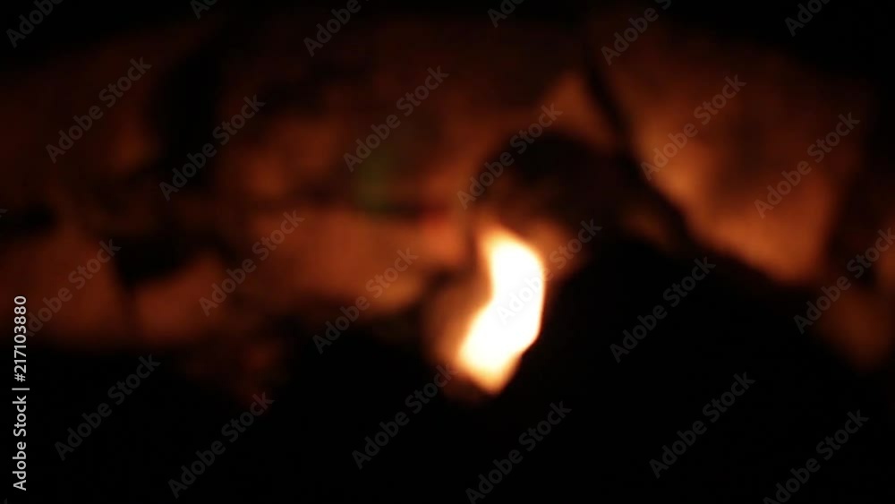 Tonight the fire is still burning bright in all of us. This little flame casts a beautiful glow on the rocks behind it. Tonight the fire is still burning bright in all of us. This little flame casts a beautiful glow on the rocks behind it.