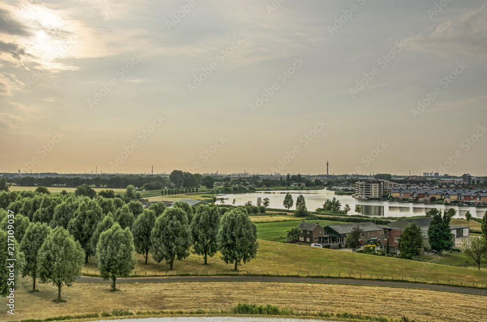 View from an artificial hill towards the lake at the edge of suburb Carnisselanden near Rotterdam