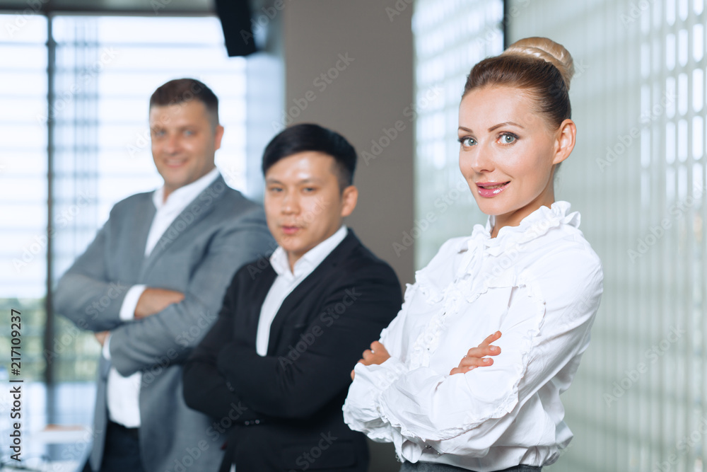 Group portrait of a professional business team looking confidently at camera