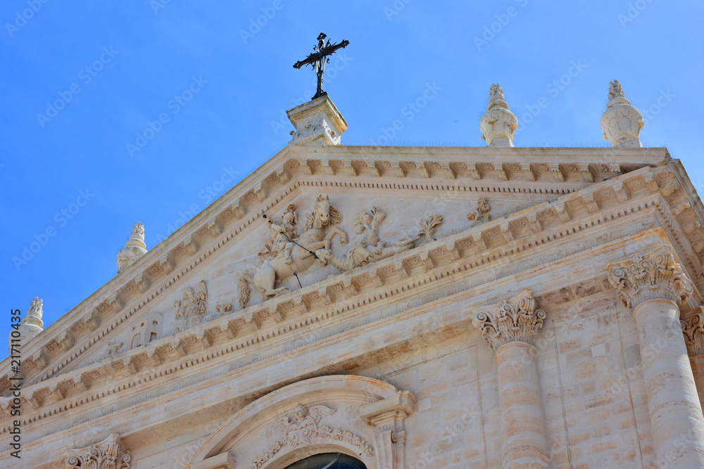 Italy, Puglia region, Locorotondo, a whitewashed village in the heart of the Itria valley, an external view of the mother church of San Giorgio