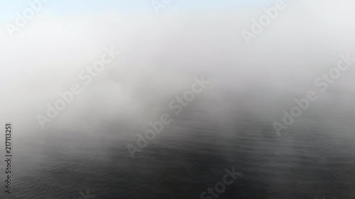 Fog over the ocean at the southern coast of Norway. At Langenes, Søgne, near Kristiansand.