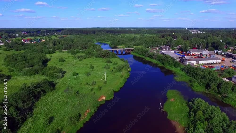 Aerial View of Rural Settlement and Bridge Crossing the River in Russia Aerial View of Rural Settlement and Bridge Crossing the River in Russia