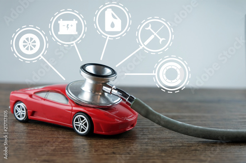 Foto Stethoscope checking up the car with car service icon, Concept of car check-up, repair and maintenance
