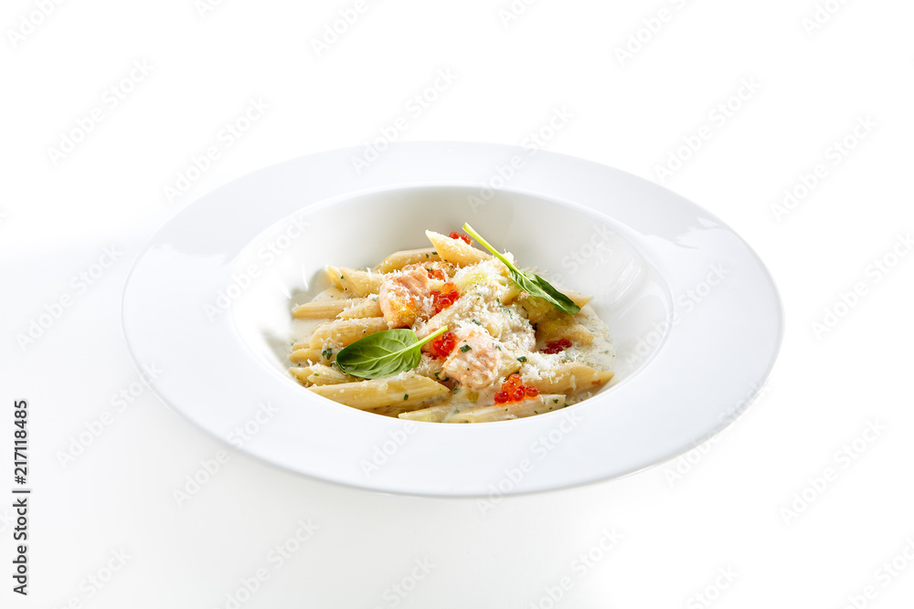 Fish Penne Pasta Al Dente with Salmon Isolated on White Background Fish Penne Pasta Al Dente with Salmon Isolated on White Background