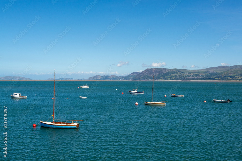Boats in the Menai Strait and Snowdonia in the background on sunny day in summer - 1