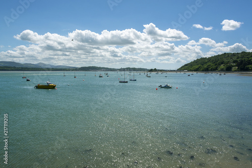 Boats anchored in the clear water of Menai Strait in summer - 1