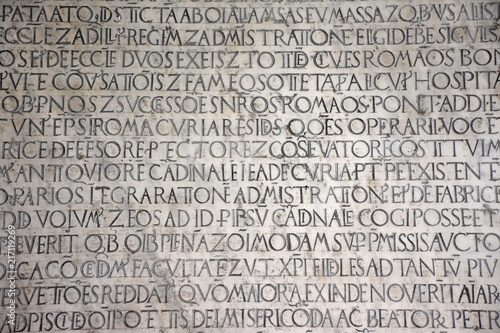 Ancient writings in Latin language of religious texts, very common in religious and historical buildings of many Italian cities.