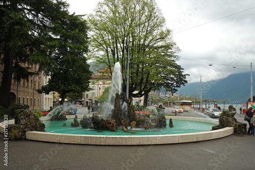 LUGANO, SWITZERLAND - APRIL 2013; A street with touristic shops and cafe