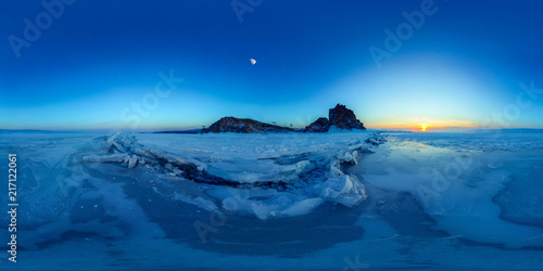 Fototapeta Naklejka Na Ścianę i Meble -  Big cracks in the ice of Lake Baikal at the Shaman Rock on Olkhon Island. Spherical 360 degree vr panorama.