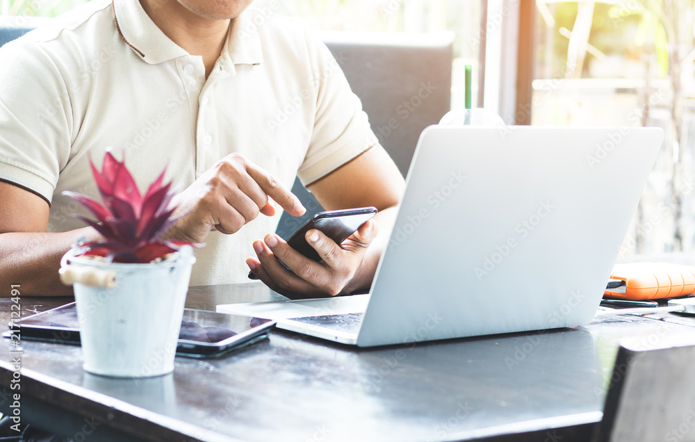 Men are using the phone to contact the job. Men are using the phone to contact the job.